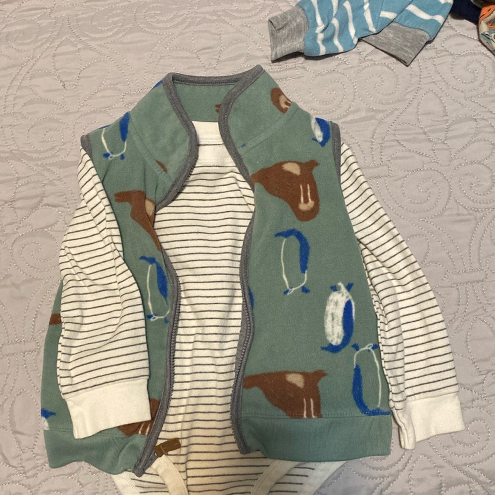 2 piece set. Super cute! Vest and onesize